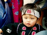 Boy in traditional gantz スロット costume
